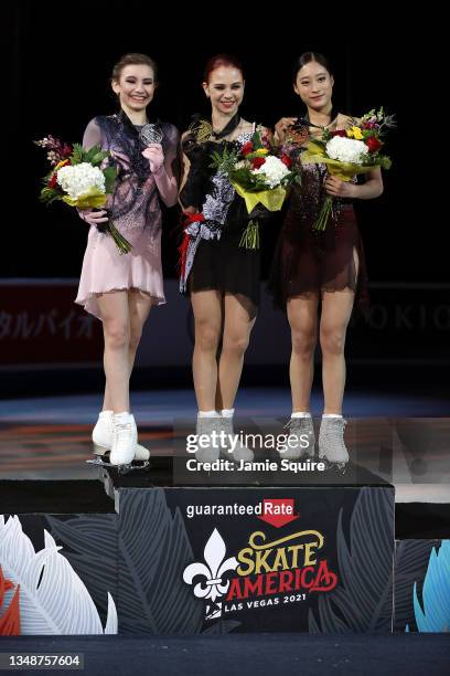 Daria Usacheva of Russia , Alexandra Trusova of Russia and Young You of Korea stand on the podium with thier medals after competing in the Womens...