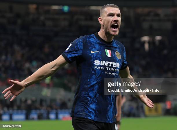 Edin Dzeko of FC Internazionale celebrates after scoring the opening goal during the Serie A match between FC Internazionale and Juventus at Stadio...