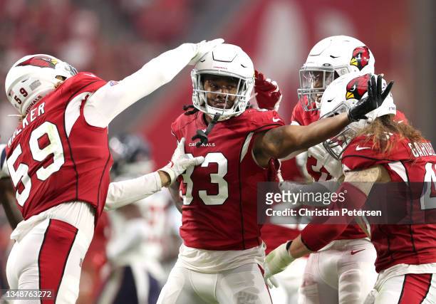 Antonio Hamilton of the Arizona Cardinals celebrates with teammates in the fourth quarter against the Houston Texans in the game at State Farm...