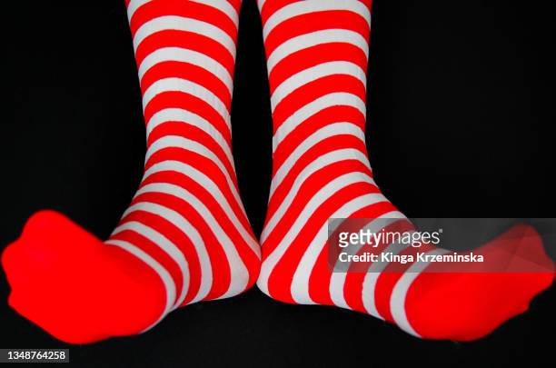 stripy socks - stockings feet 個照片及圖片檔