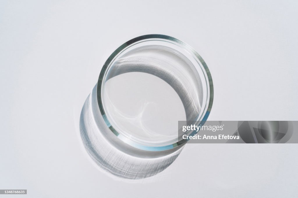 Empty Petri dish on gray background. Concept of laboratory researches. Photography in flat lay style