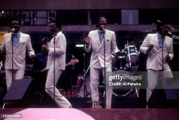 Motown groups The Temptations and The Four Tops take the stage during the "T N T Tour" at Giants Stadium on May 10, 1984 in East Rutherford, New...