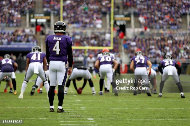 Punter Sam Koch of the Baltimore Ravens kicks the ball against the Cincinnati Bengals at M&T Bank Stadium on October 24, 2021 in Baltimore, Maryland.