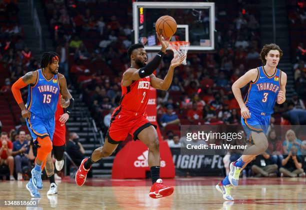 David Nwaba of the Houston Rockets passes the ball in the first half against the Oklahoma City Thunder at Toyota Center on October 22, 2021 in...