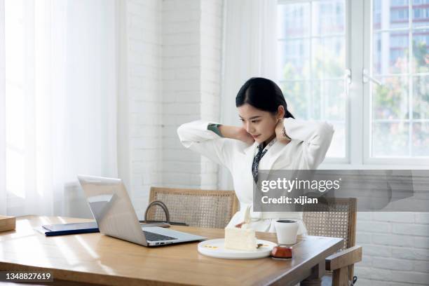 young businesswoman neckache - person with a neck pain stock pictures, royalty-free photos & images