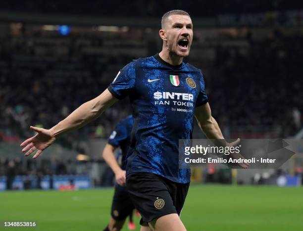 Edin Dzeko of FC Internazionale celebrates after scoring the opening goal during the Serie A match between FC Internazionale and Juventus at Stadio...