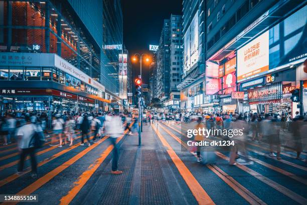 hong kong ,  nathan road - crowded city stock pictures, royalty-free photos & images