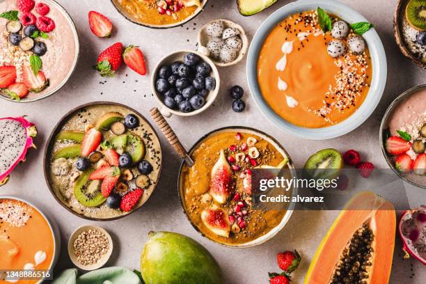 variety of healthy smoothie bowls - schaal stockfoto's en -beelden