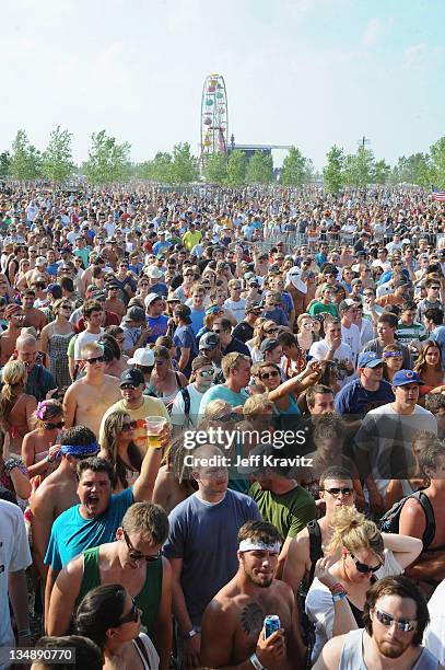 Fans watch moe. Perform during day two of Dave Matthews Band Caravan at Lakeside on July 9, 2011 in Chicago, Illinois.