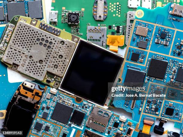 full frame of mobile phone circuit boards to be recycled. - disassembling stockfoto's en -beelden