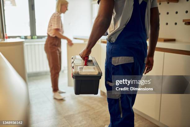 plumber came to customer’s home to fix the problem - toolbox stock pictures, royalty-free photos & images