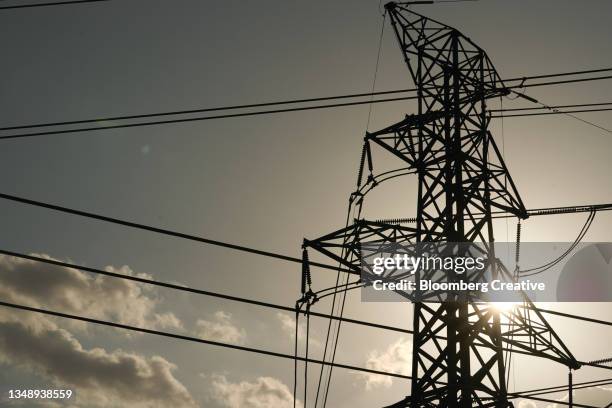 electrical power lines - electrical grid stock pictures, royalty-free photos & images