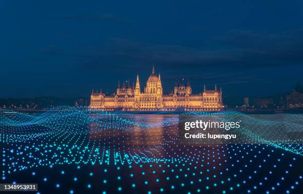 cityscape with abstract particles in hungarian parliament,budapest - budapest skyline stock pictures, royalty-free photos & images
