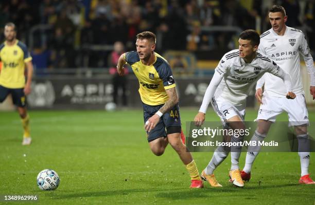 Siebe Van Der Heyden of Union battles for the ball with Stef Peeters of KAS Eupen during the Jupiler Pro League match between KAS Eupen and Royale...