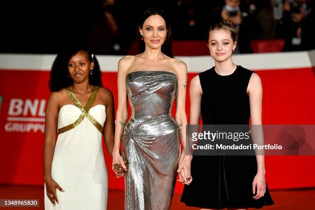 American actress Angelina Jolie with daughters Zahara Marley Jolie-Pitt and Shiloh Jolie-Pitt at Rome Film Fest 2021. Eternals Red Carpet. Rome ,...
