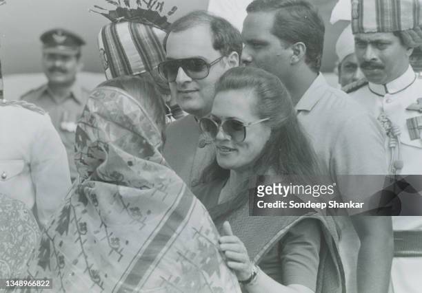 Indian Prime Minister Rajiv Gandhi's wife Sonia greets and embraces Rowshan Ershad, wife of Bangladesh President General H.M. Ershad on arrival at...