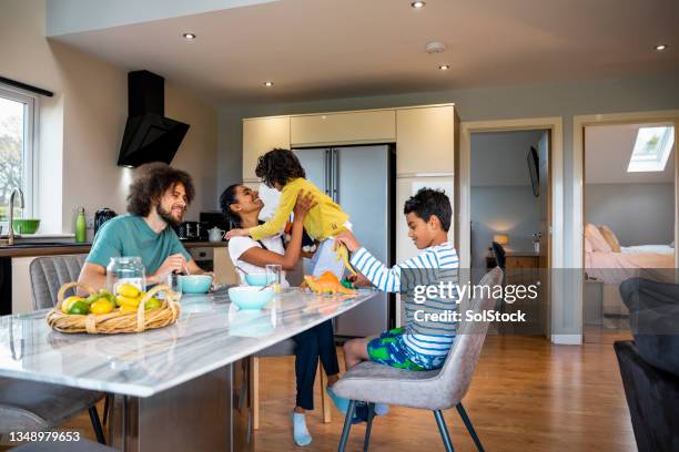 playing at breakfast time - sri lankan ethnicity stock pictures, royalty-free photos & images