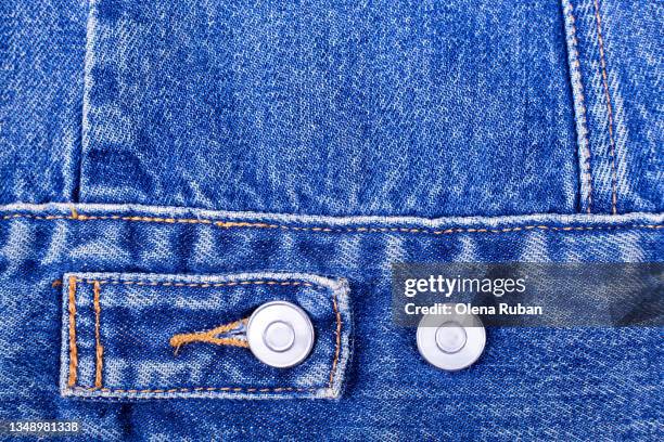 details of jeans clothes - satijnen jak stockfoto's en -beelden