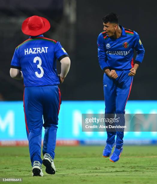 Mujeeb Ur Rahman of Afghanistan celebrates the wicket of Kyle Coetzer of Scotland during the ICC Men's T20 World Cup match between Afghanistan and...