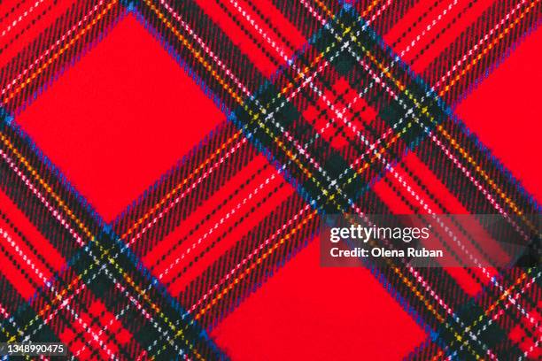 top view of red and green tartan plaid - red plaid stock pictures, royalty-free photos & images