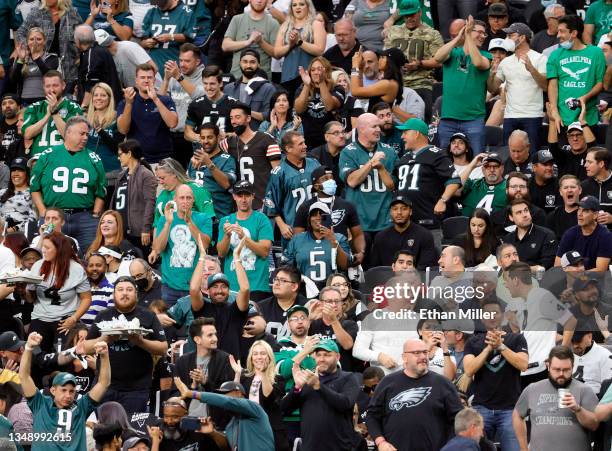 Philadelphia Eagles fans celebrate after a 13-yard touchdown by running back Kenneth Gainwell against the Las Vegas Raiders during their game at...