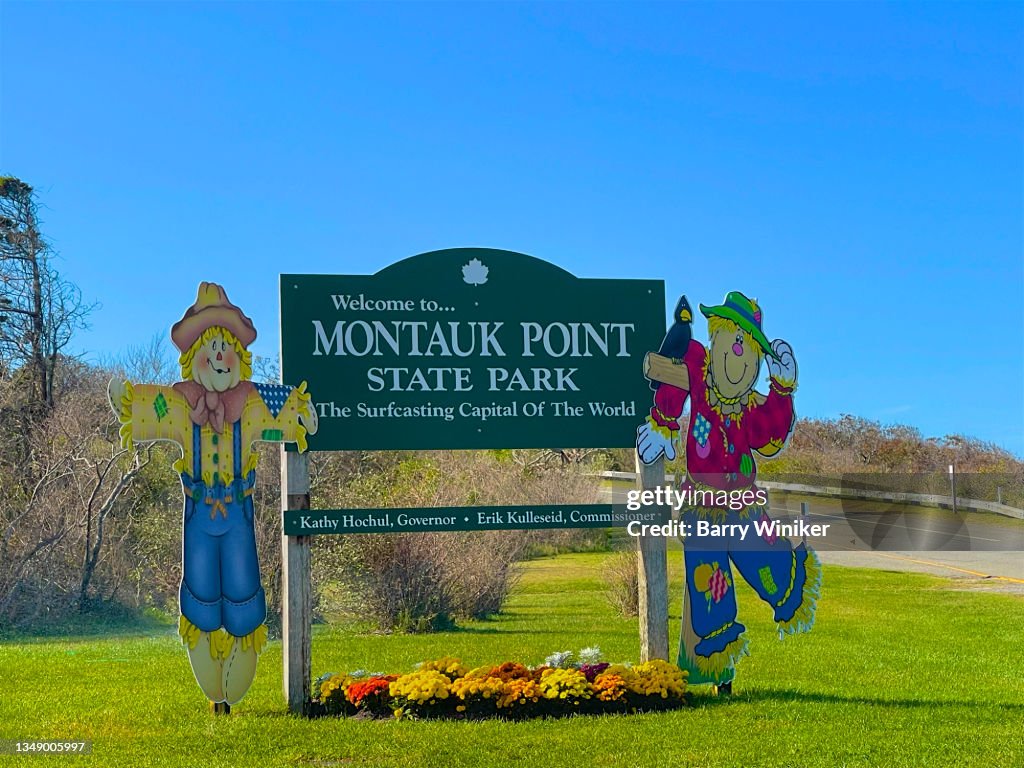 Sign with scarecrows at Montauk Point State Park
