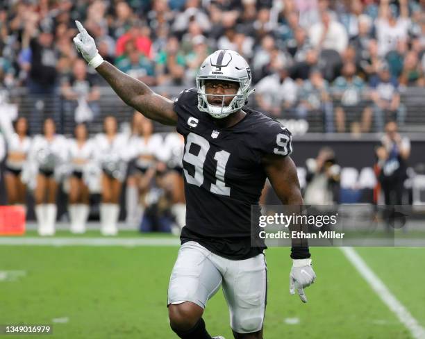 Defensive end Yannick Ngakoue of the Las Vegas Raiders celebrates after batting down a pass during a game against the Philadelphia Eagles at...