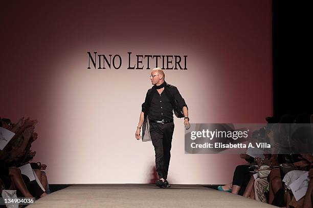 Designer Nino Lettieri acknowledges the applause of the public during his fashion show as part of AltaRoma AltaModa Autumn/Winter 2010 on July 12,...