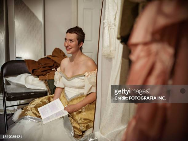 actress in period costume in dressing room - theatre performer stockfoto's en -beelden