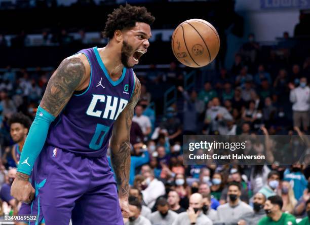 Miles Bridges of the Charlotte Hornets reacts after dunking against the Boston Celtics during the first half of their game at Spectrum Center on...