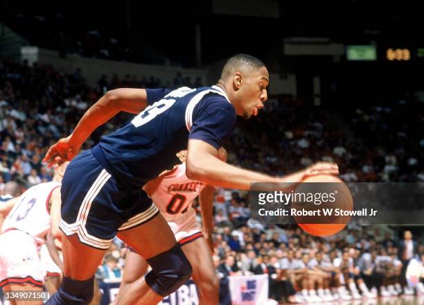 Georgetown's Alonzo Mourning heads up court vs UConn, Hartford CT 1990.