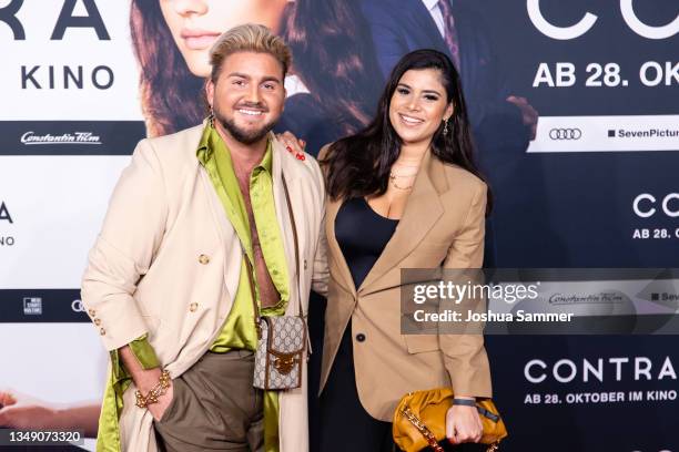 Justus Toussis and Tanja Tischewitsch attend the premiere of "Contra" at Cinedom on October 25, 2021 in Cologne, Germany.