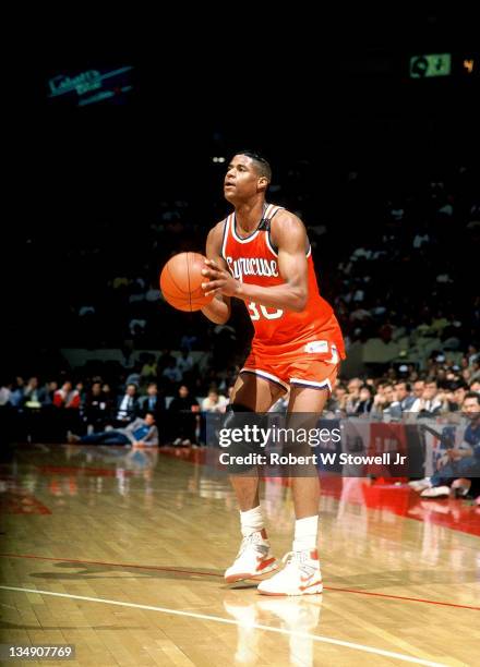 Syracuse's Billy Owens prepares to shoot a three pointer against the University of Connecticut, Hartford CT 1990.