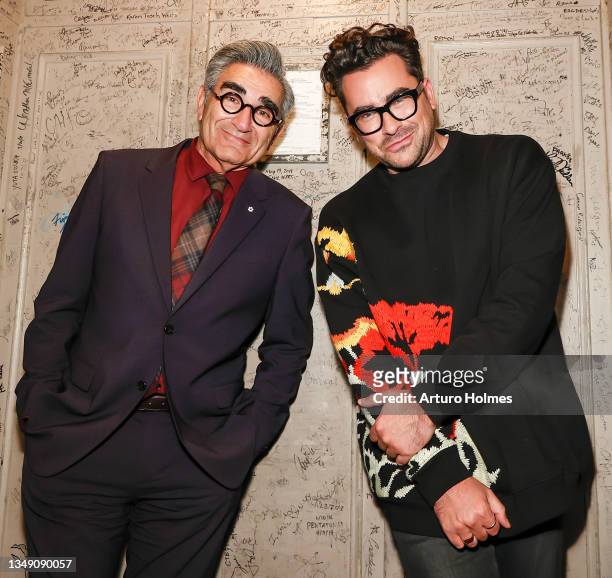 Eugene Levy and Dan Levy are seen during the "Best Wishes, Warmest Regards" book launch at The Beacon Theatre on October 25, 2021 in New York City.