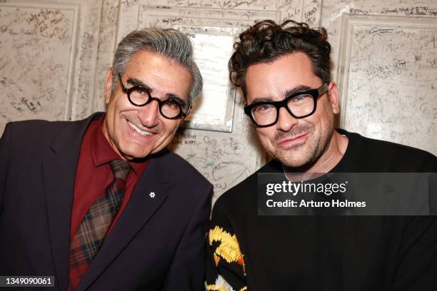 Eugene Levy and Dan Levy are seen during the "Best Wishes, Warmest Regards" book launch at The Beacon Theatre on October 25, 2021 in New York City.