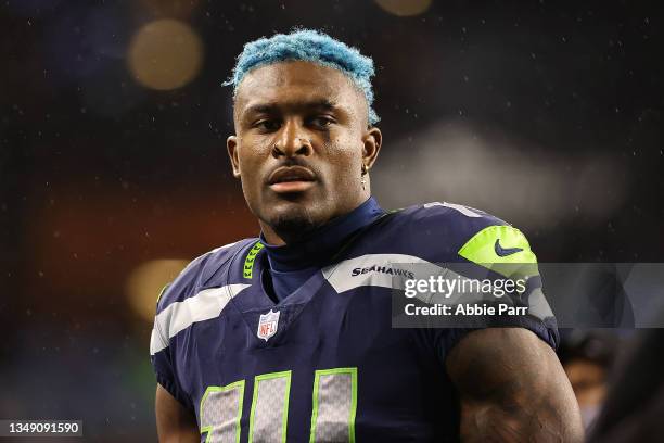 Metcalf of the Seattle Seahawks leaves the field following a game against the New Orleans Saints at Lumen Field on October 25, 2021 in Seattle,...