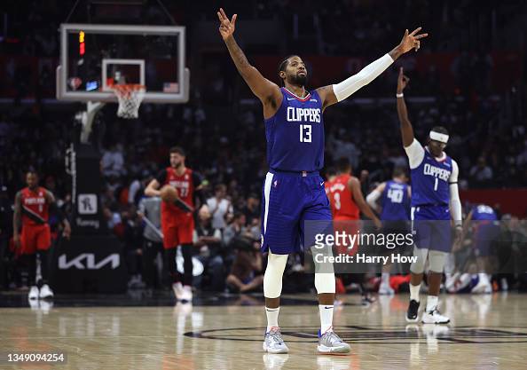 LOS ANGELES, CA - DECEMBER 03: Los Angeles Clippers Guard Paul George (13)  shoots a three pointer during a NBA game between the Portland Trail Blazers  and the Los Angeles Clippers on