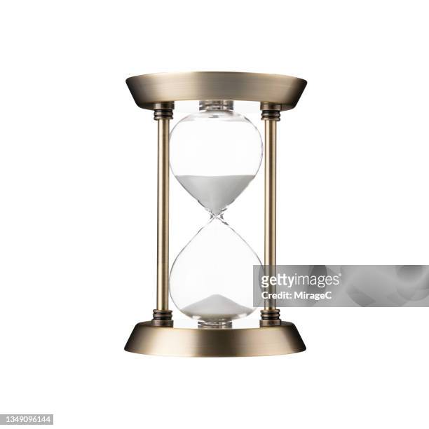 retro style brass sand hourglass isolated on white - sablier photos et images de collection