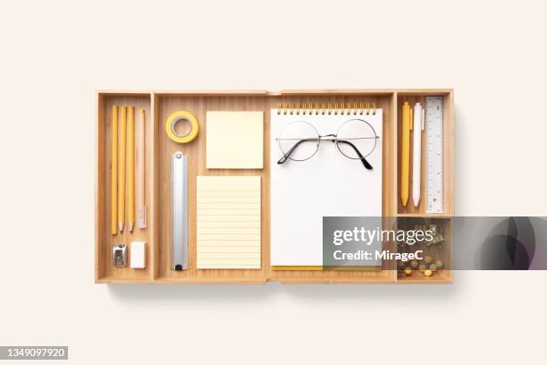 organized stationery in wood drawer trays - knolling concept stock pictures, royalty-free photos & images