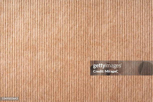 embossed stripe brown craft paper texture - paperboard stockfoto's en -beelden