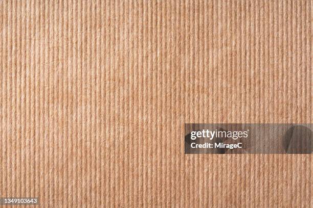 embossed stripe brown craft paper texture - notch stock pictures, royalty-free photos & images