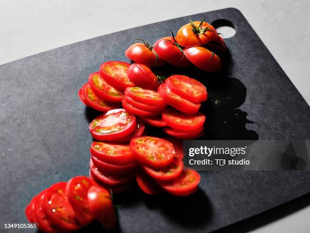 cut tomatoes - acetylcholine stock pictures, royalty-free photos & images