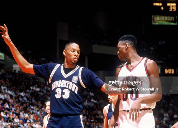 Georgetown's Alonzo Mourning defends the inbounds pass against the University of Connecticut's Cliff Robinson, Hartford CT 1989.