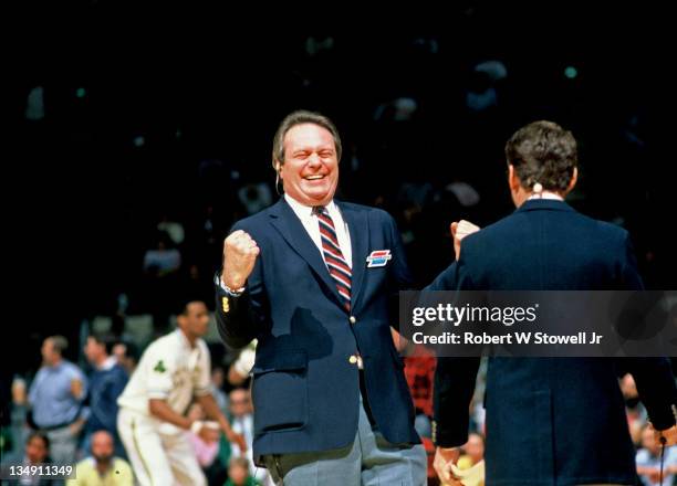 Tommy Heinsohn, sports channel announcer for Boston Celtics games, enjoys a laugh during pre-game activities, Hartford CT 1991.