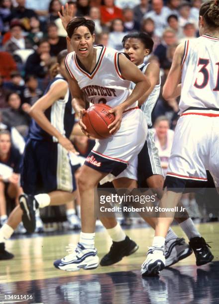 University of Connecticut star Nykesha Sales rebounds against Georgetown, Storrs CT 1996.