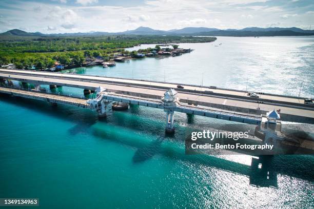 aerial view of sarasin bridge with beautiful sky and sea, phuket island, thailand. - phuket province 個照片及圖片檔