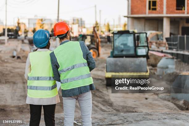 engineer team discuss and working at construction property site. - road work stock pictures, royalty-free photos & images