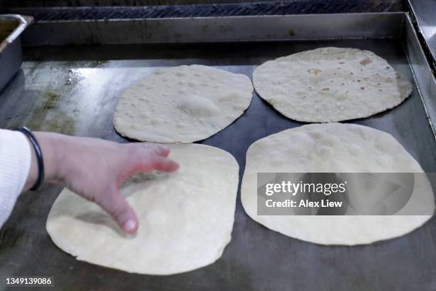 food preparation - roti stock pictures, royalty-free photos & images
