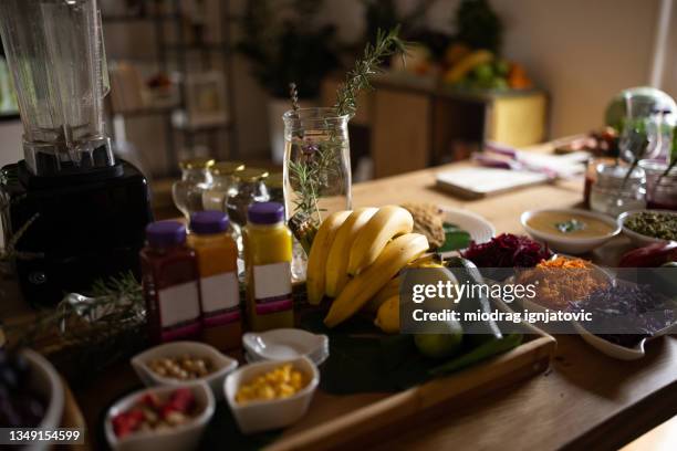 organic food for healthy antioxidant diet on table - avocado smoothie stock pictures, royalty-free photos & images