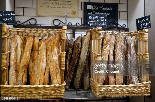 Freshly baked baguettes are seen inside a bakery on October 26, 2021 in Paris, France. After soaring gas, electricity and petrol prices, the baguette...